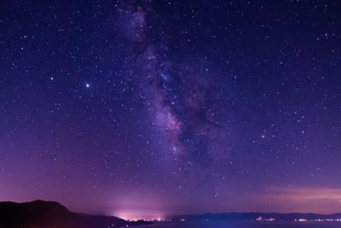 a purply starry night image