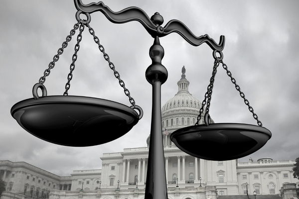 Scales balanced evenly in front of the Capital Building. 