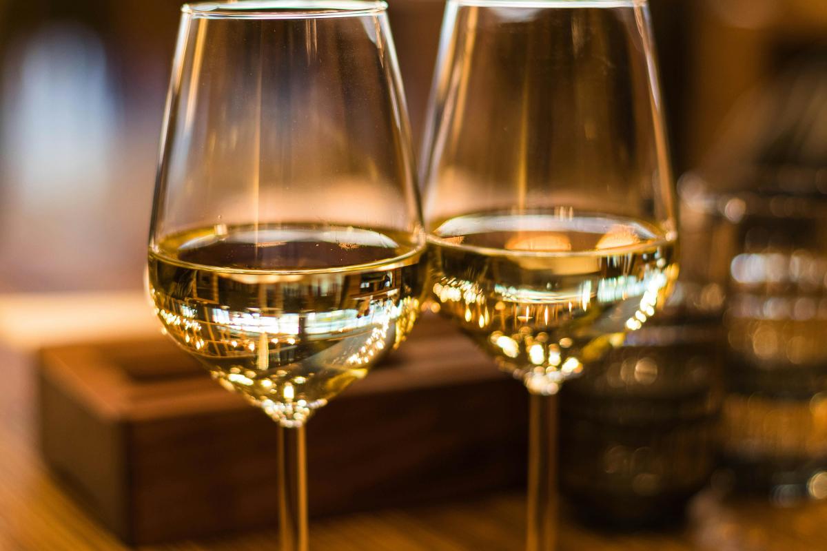 image of wine glasses holding white wine